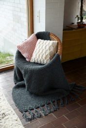 Novita Hygge: Piilopaikka (Hiding Place) knitted blanket