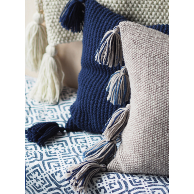 Knitted navy-coloured, textured pillow Novita 7 Veljestä